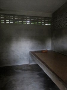 Bed with wooden pillow